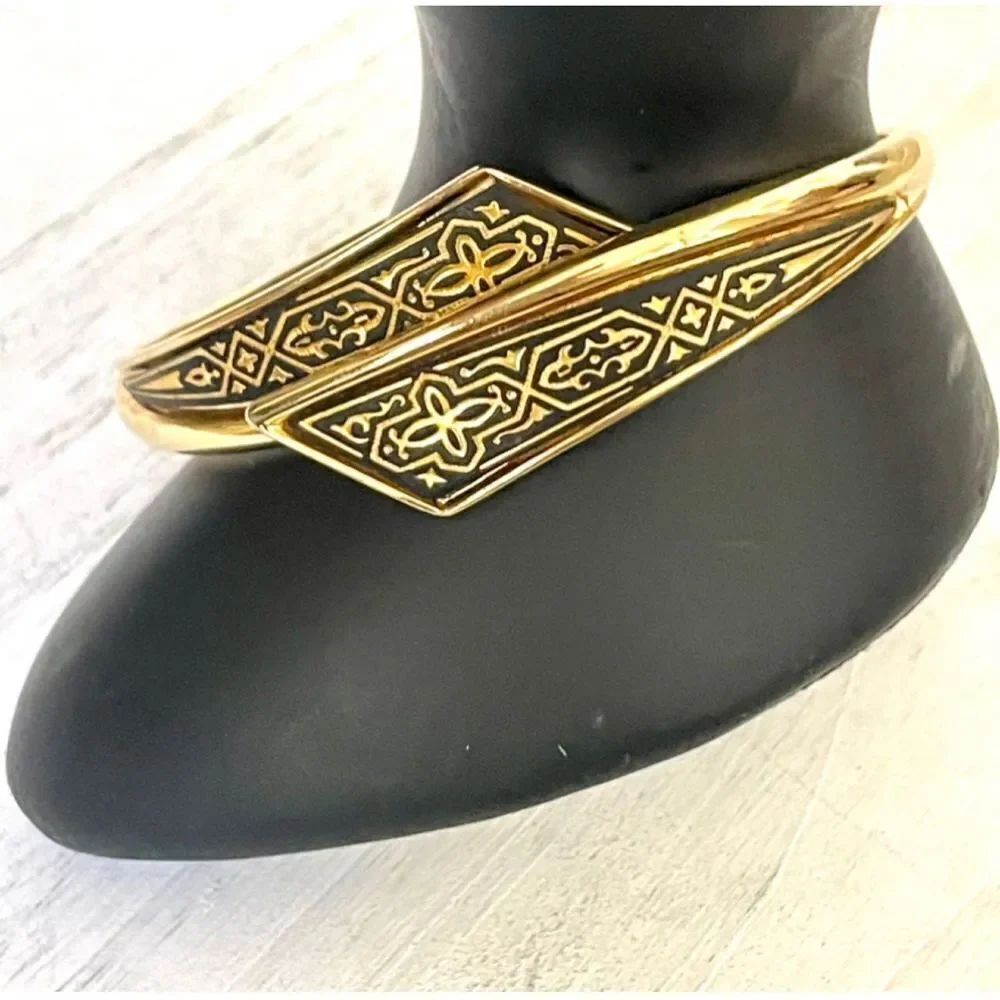 Gold tone black etched bracelet